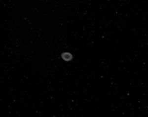 Ring Nebula Two dying stars that are puffing off the outer layers of their atmospheres.